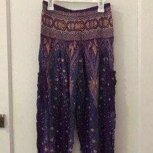 Purple women’s harem pants. Size large but fit small. Good condition.
